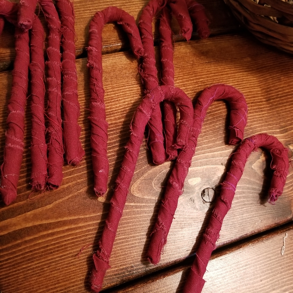 Bundle of (10) Homespun/fabric wrapped candy canes in Burgundy.